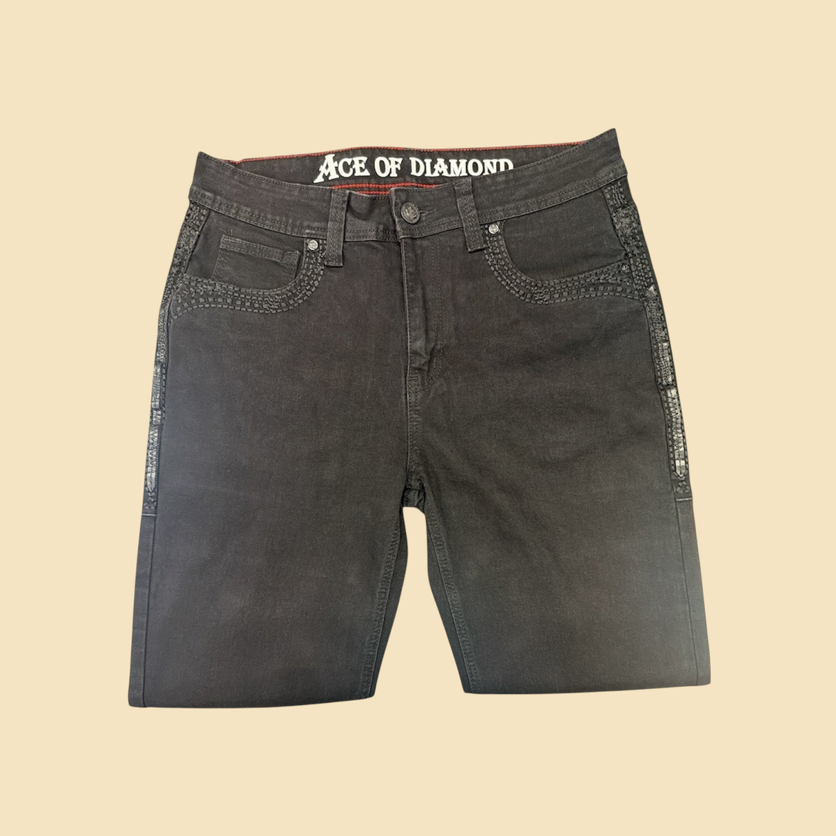 Lopez Fashion Ace of Diamond black denim jeans featuring intricate tonal embroidery and side panel detailing.