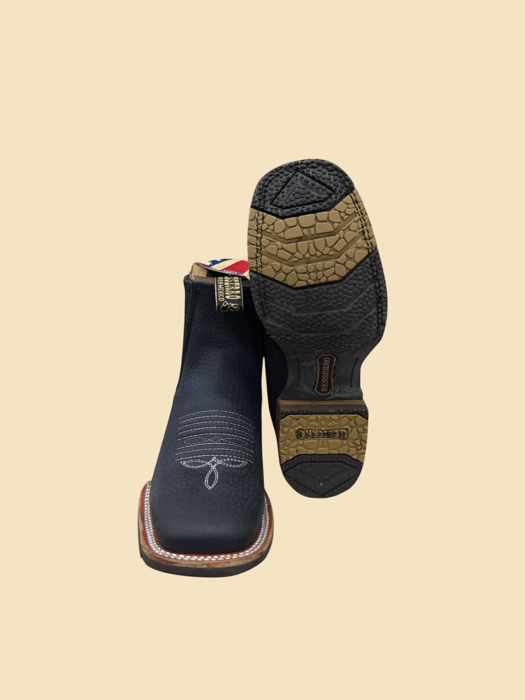 Lopez Fashion BESSERRO black leather square toe western Chelsea boots showing the textured upper and rubber outsole