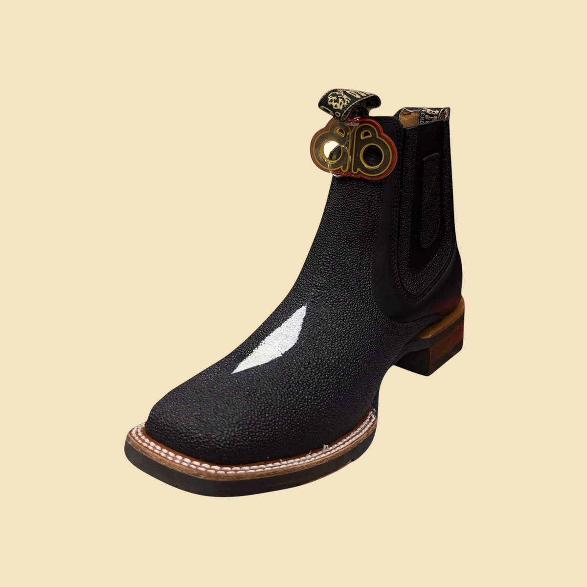 Lopez Fashion BESSERRO black stingray leather Chelsea boot with a square toe and signature white star pattern.