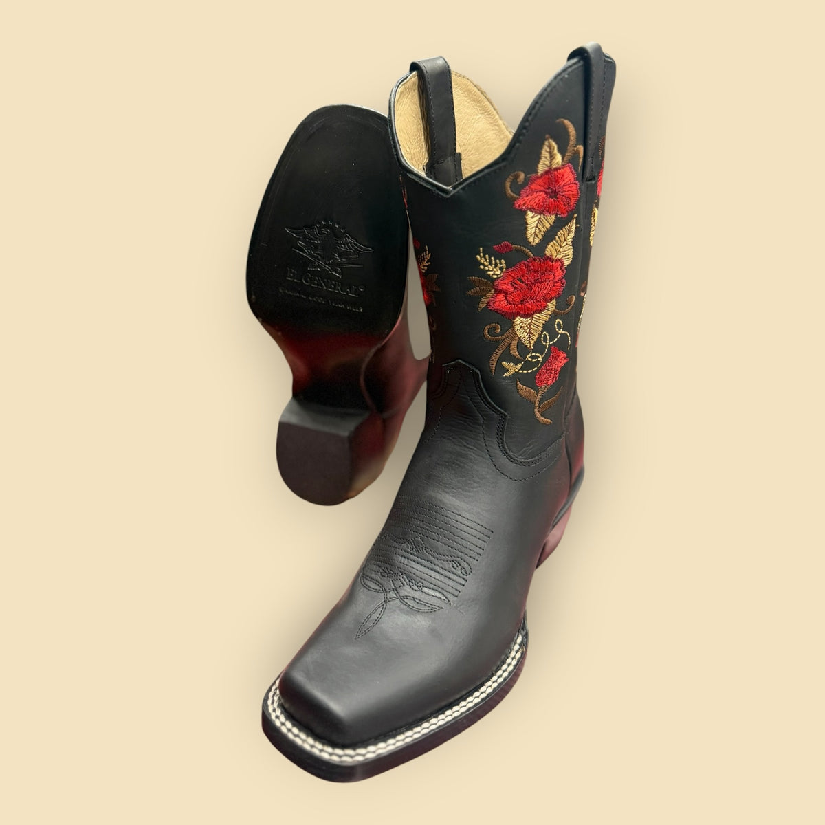 Lopez Fashion black leather cowboy boots with vibrant red floral embroidery and a square toe design.