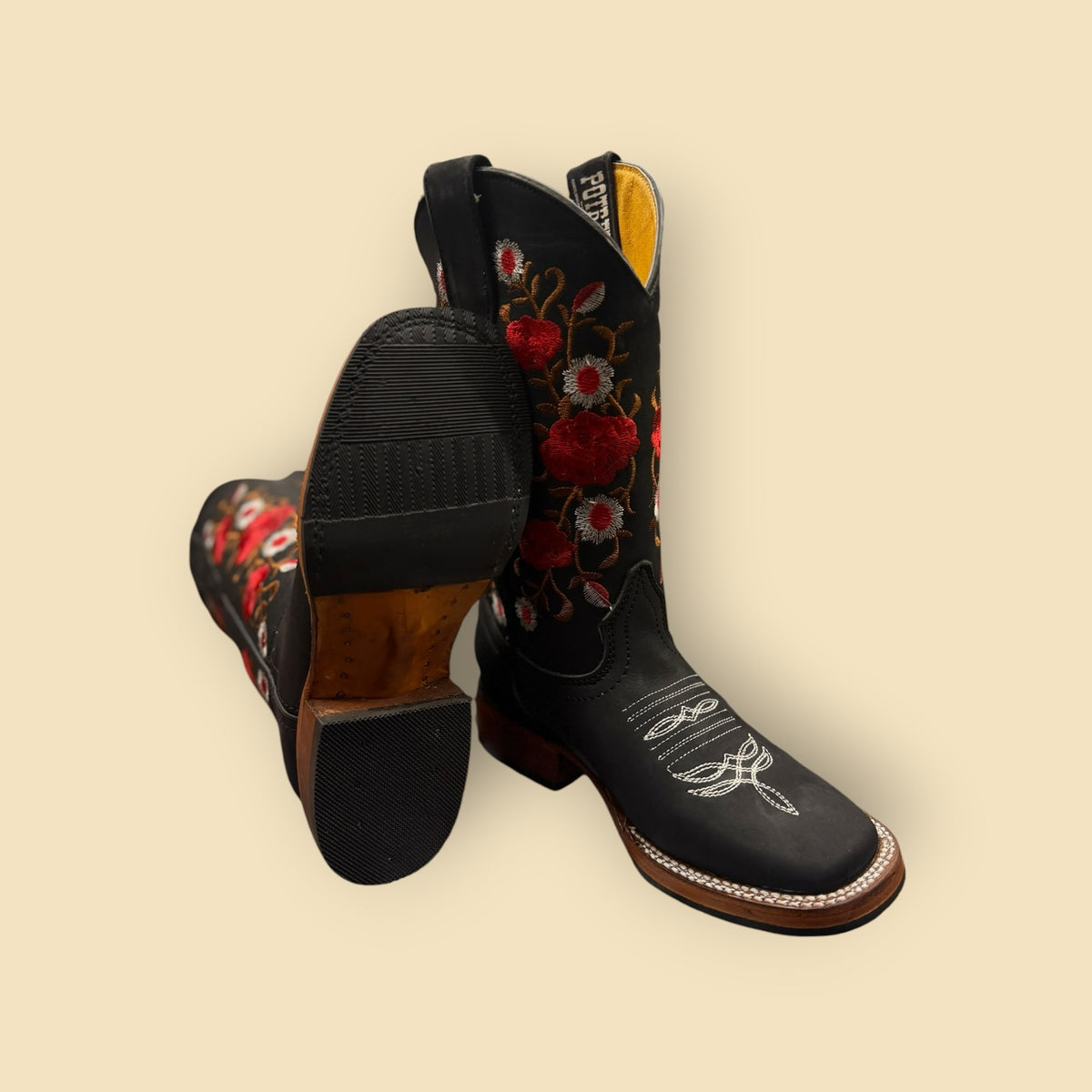 Lopez Fashion black leather cowboy boots with vibrant red and white floral embroidery and a square-toe design.