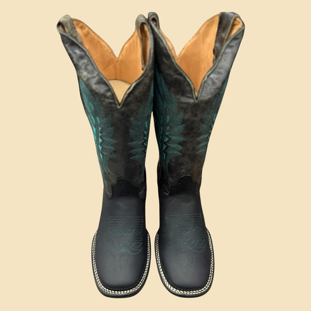 Lopez Fashion black leather cowboy boots with turquoise embroidery and square toe design on a neutral background