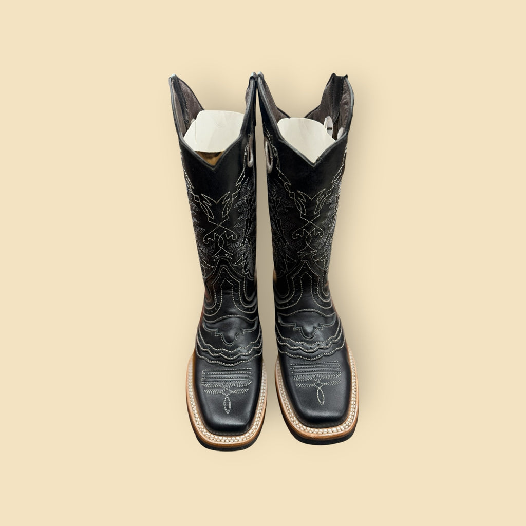 Lopez Fashion black leather cowboy boots with white contrast stitching and a square toe silhouette.