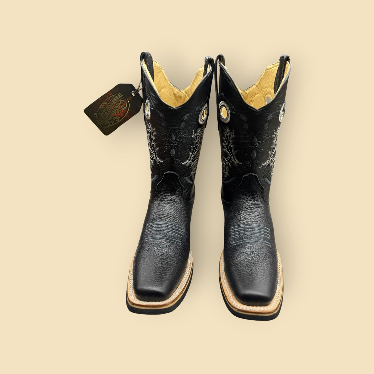 Lopez Fashion Lamas Chaparral black leather western boots with square toe and intricate white shaft embroidery.