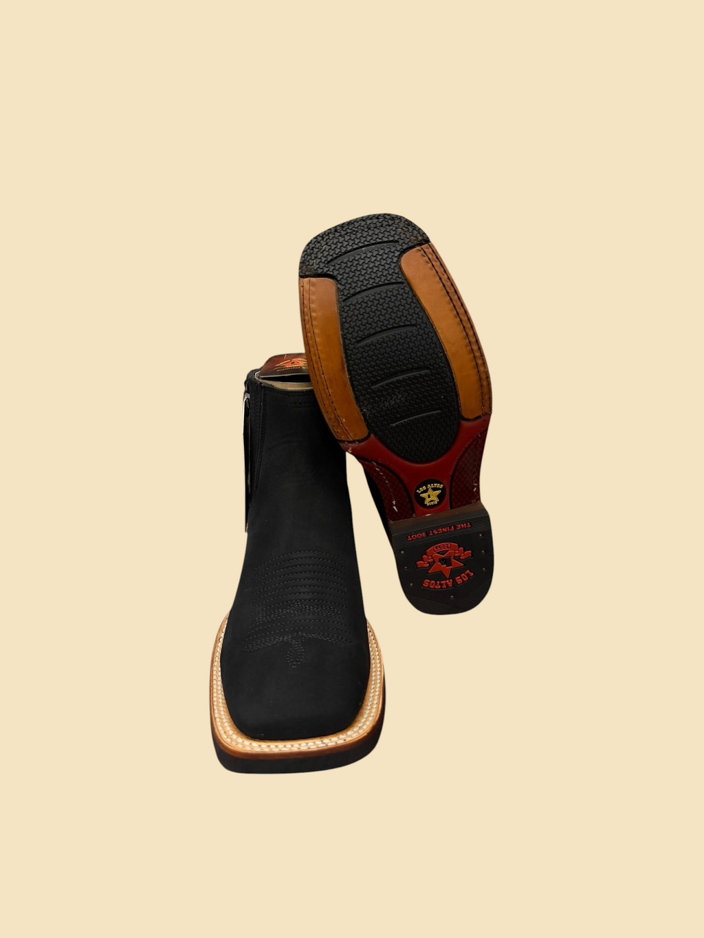 Lopez Fashion black leather square toe western ankle boots showing the matte finish and durable rubber outsole