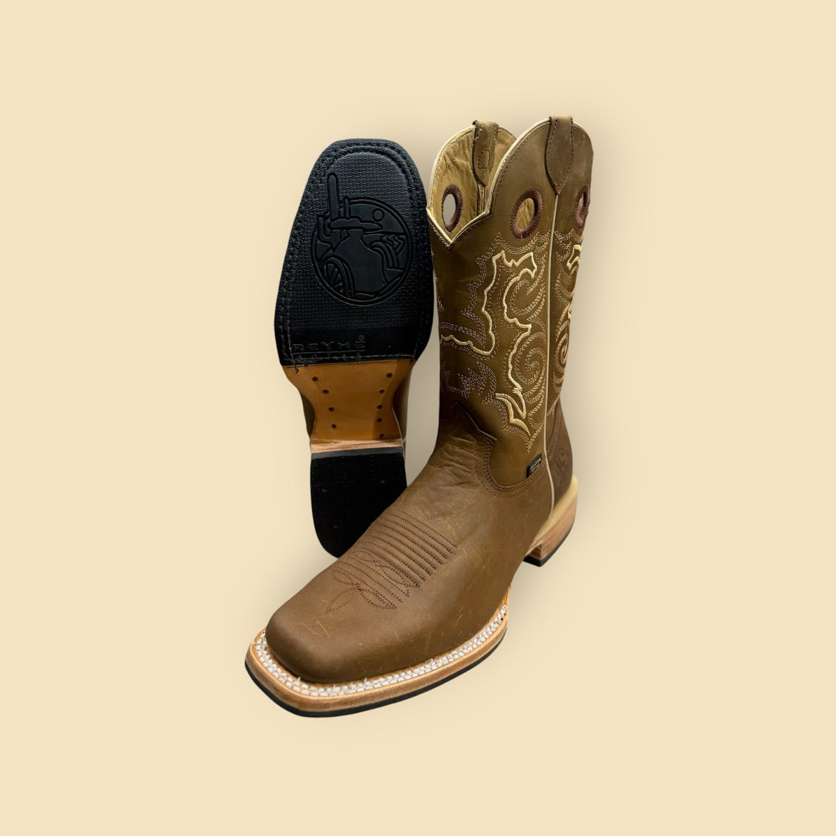 Lopez Fashion brown leather square toe cowboy boots with intricate embroidery and a durable non-slip rubber outsole.