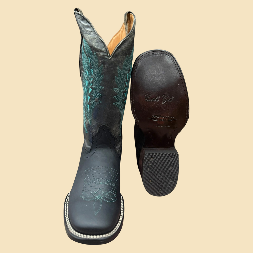 Lopez Fashion Castilla Gold cowboy boots with black leather, turquoise embroidery, and a durable leather outsole.