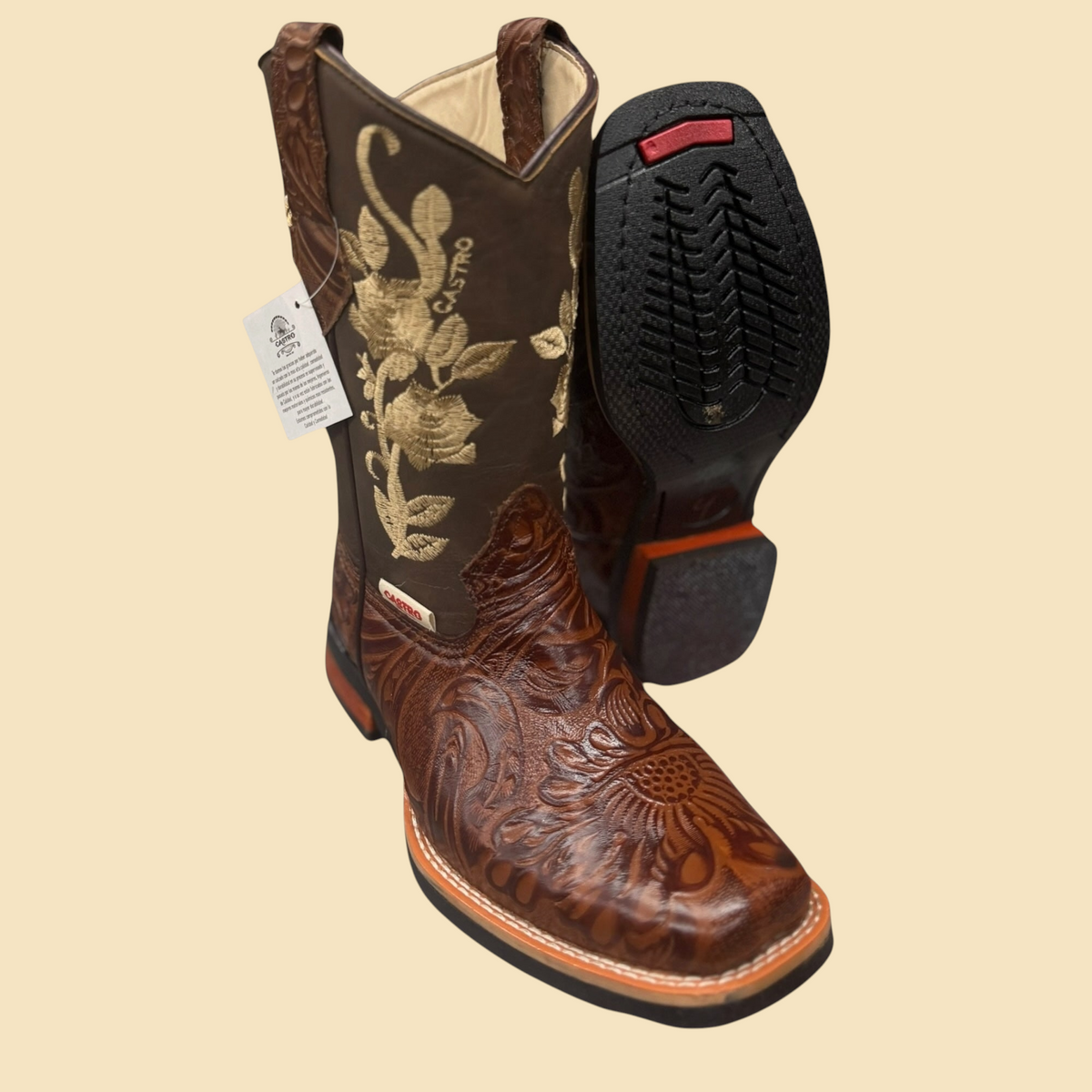 Lopez Fashion Castro brown leather cowboy boots with floral embossing and golden embroidery, featuring a square toe.