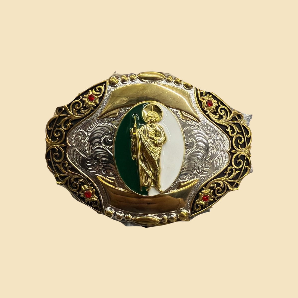Lopez Fashion ornate oval western belt buckle with a gold saint emblem, green and white enamel, and red stone accents.