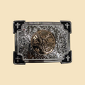 Lopez Fashion rectangular silver belt buckle with floral scrollwork, gold Saint Michael medallion, and cross accents.