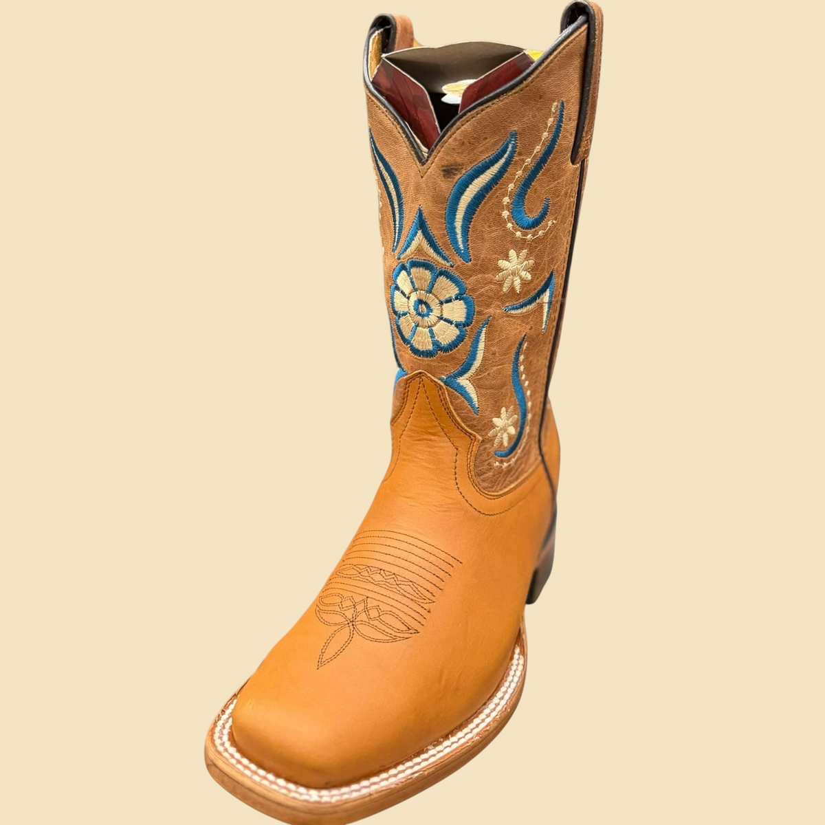 Lopez Fashion tan leather Western boots with square toe and blue and cream floral embroidery on the shaft