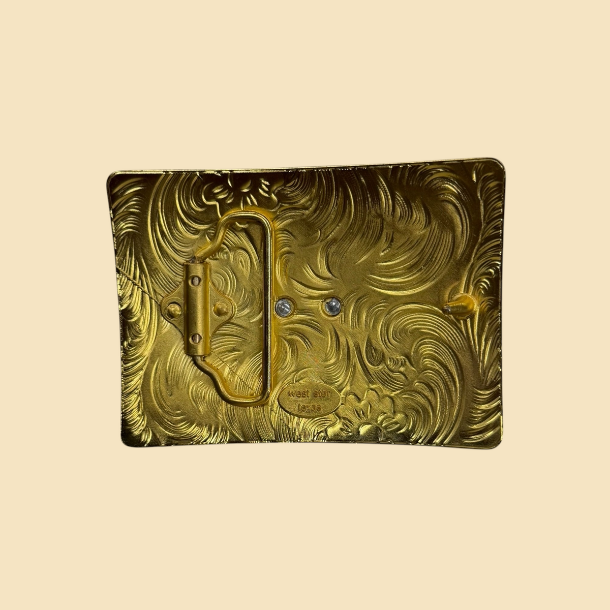 Lopez Fashion rectangular western belt buckle back view with gold-tone embossed floral scrollwork and metal hardware