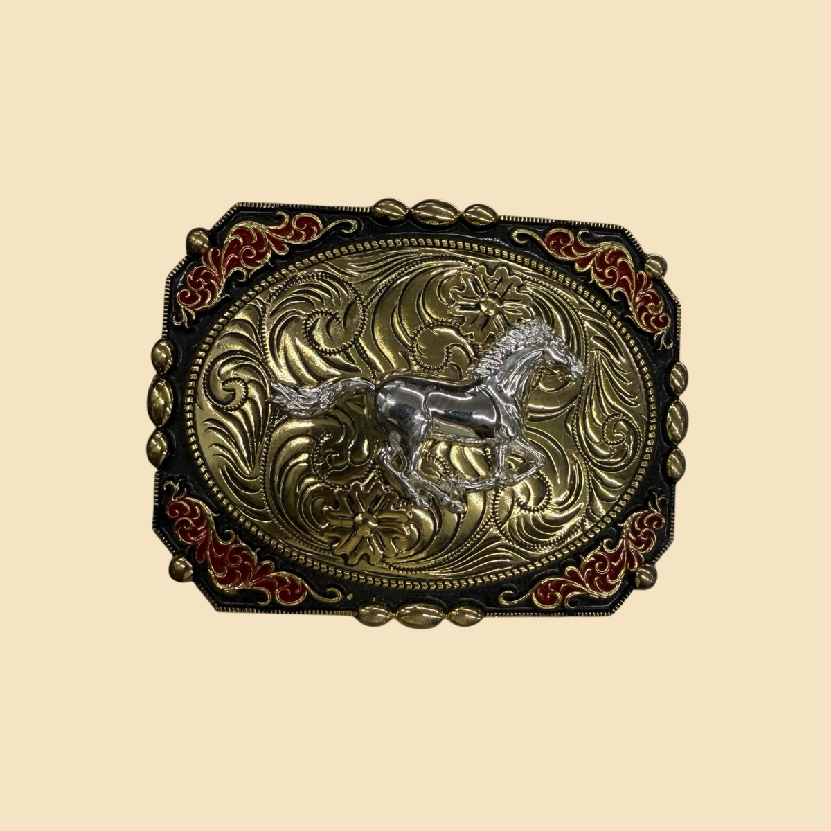 Lopez Fashion rectangular western belt buckle featuring a silver horse on gold floral scrollwork with red enamel accents.